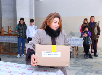 Binəqədi rayonunda Xocalı faciəsinin 31-ci ildönümü ilə əlaqədar Xocalıdan olan ailələrə humanitar yardımın paylanması